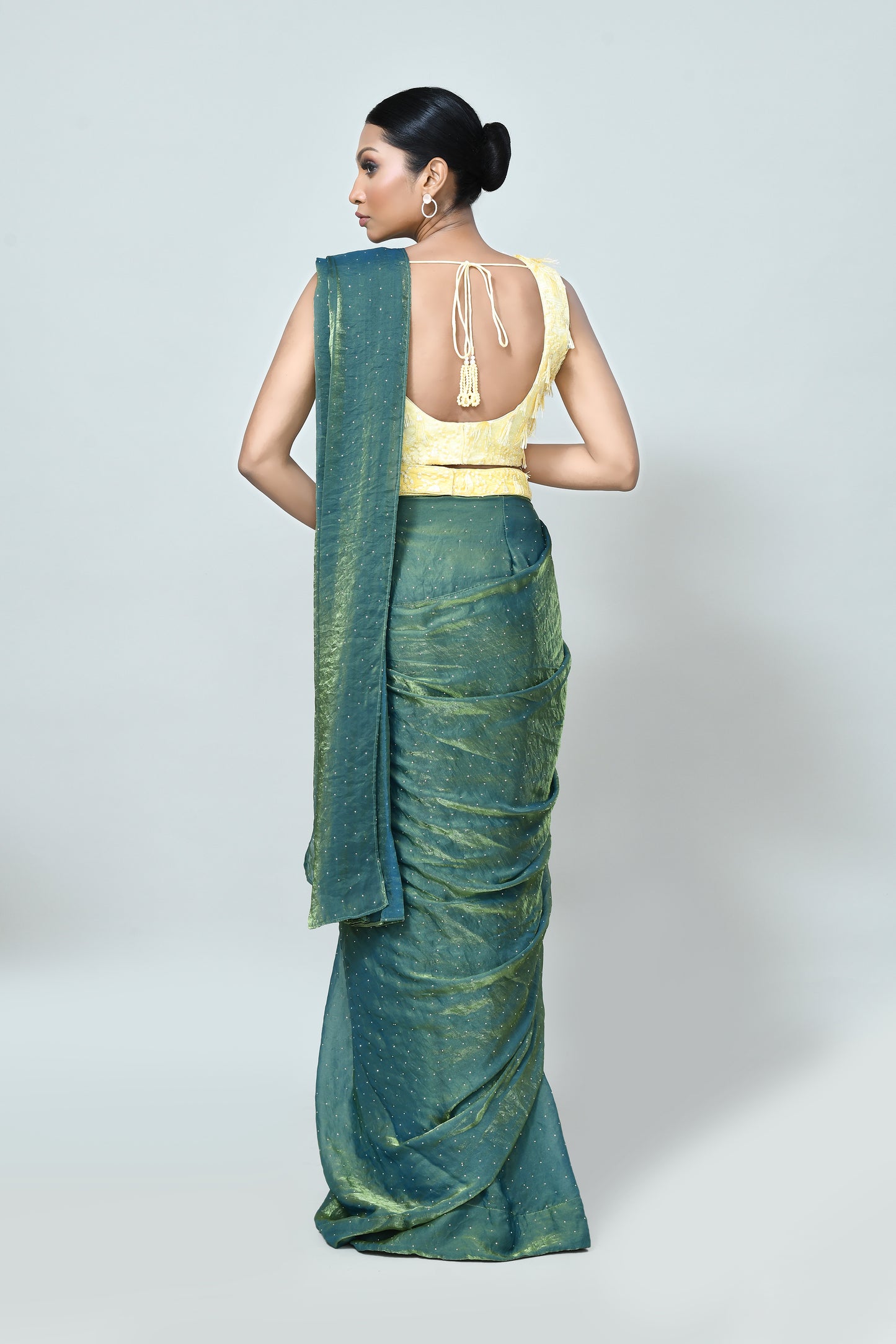 Designer Wear Metallic Green Diamond Silk Drape Saree