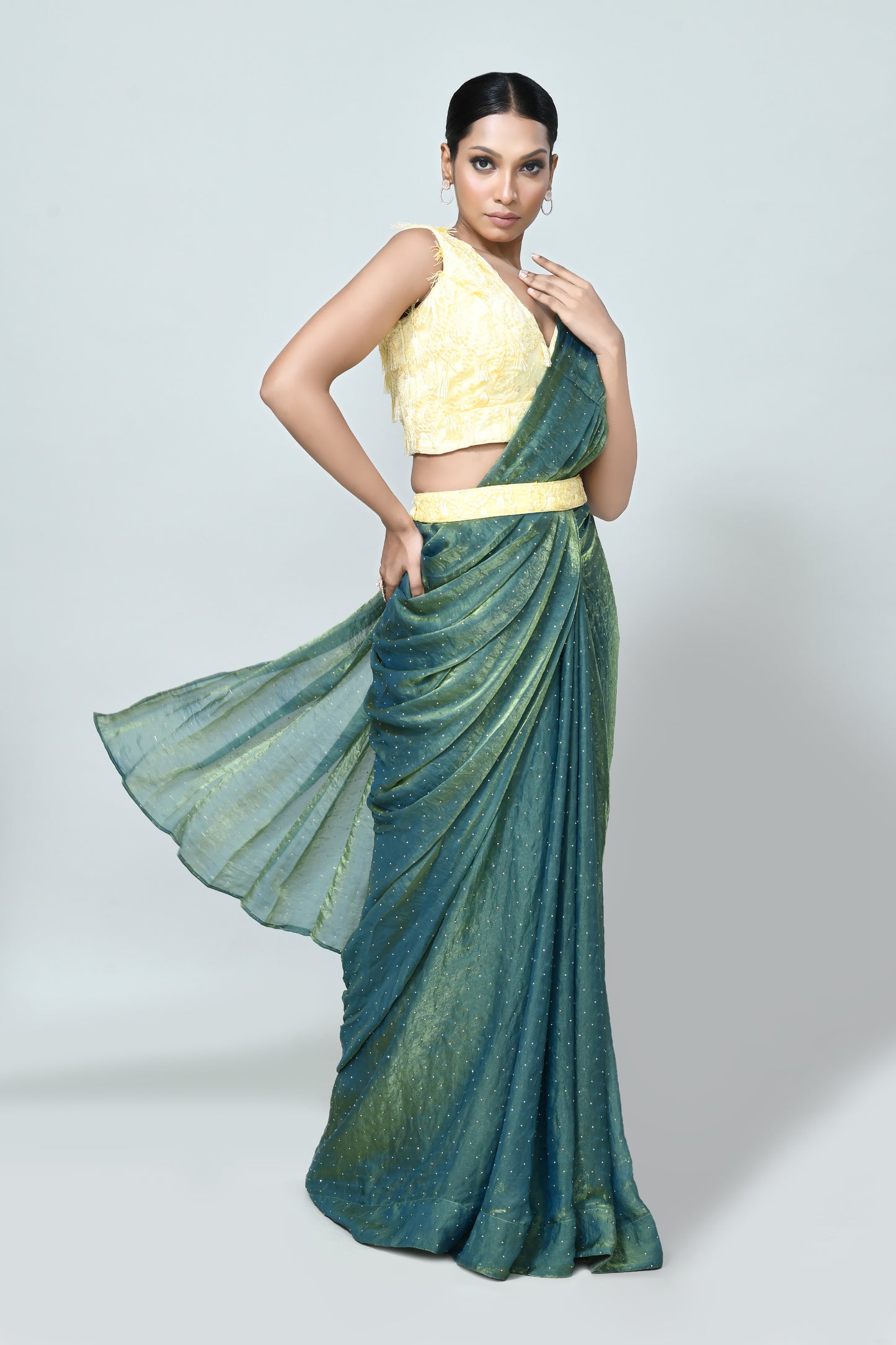 Designer Wear Metallic Green Diamond Silk Drape Saree