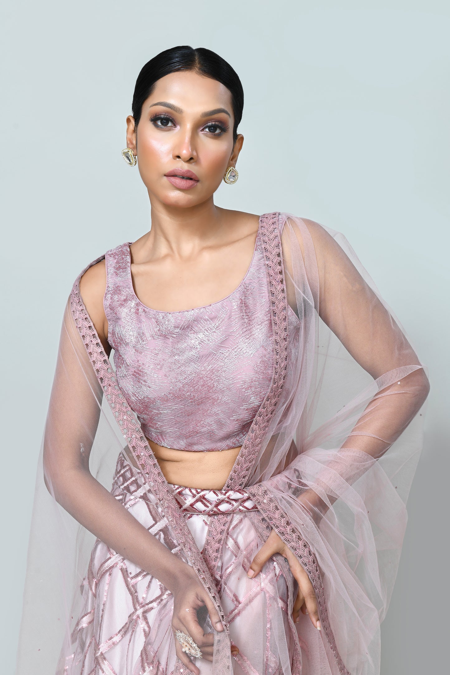 Designer Wear Mauve Net Lehenga Set