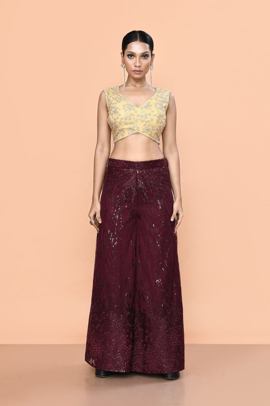 Designer Wear Maroon Net Palazzo With Golden Crop Top Set - Simaaya