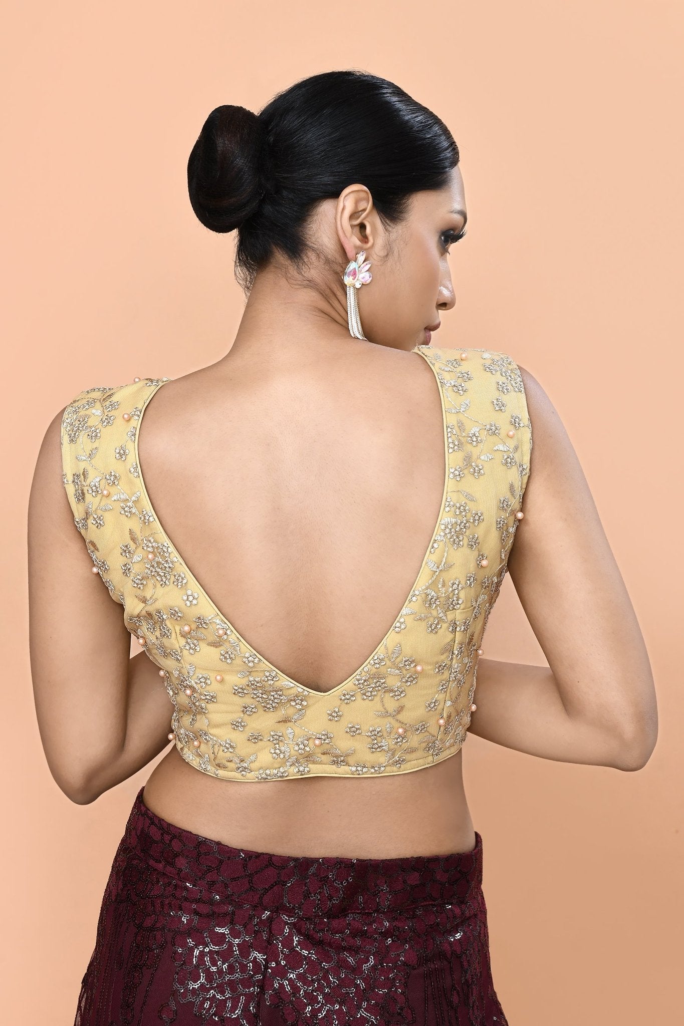Designer Wear Maroon Net Palazzo With Golden Crop Top Set - Simaaya