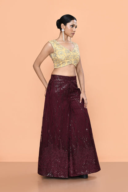 Designer Wear Maroon Net Palazzo With Golden Crop Top Set - Simaaya
