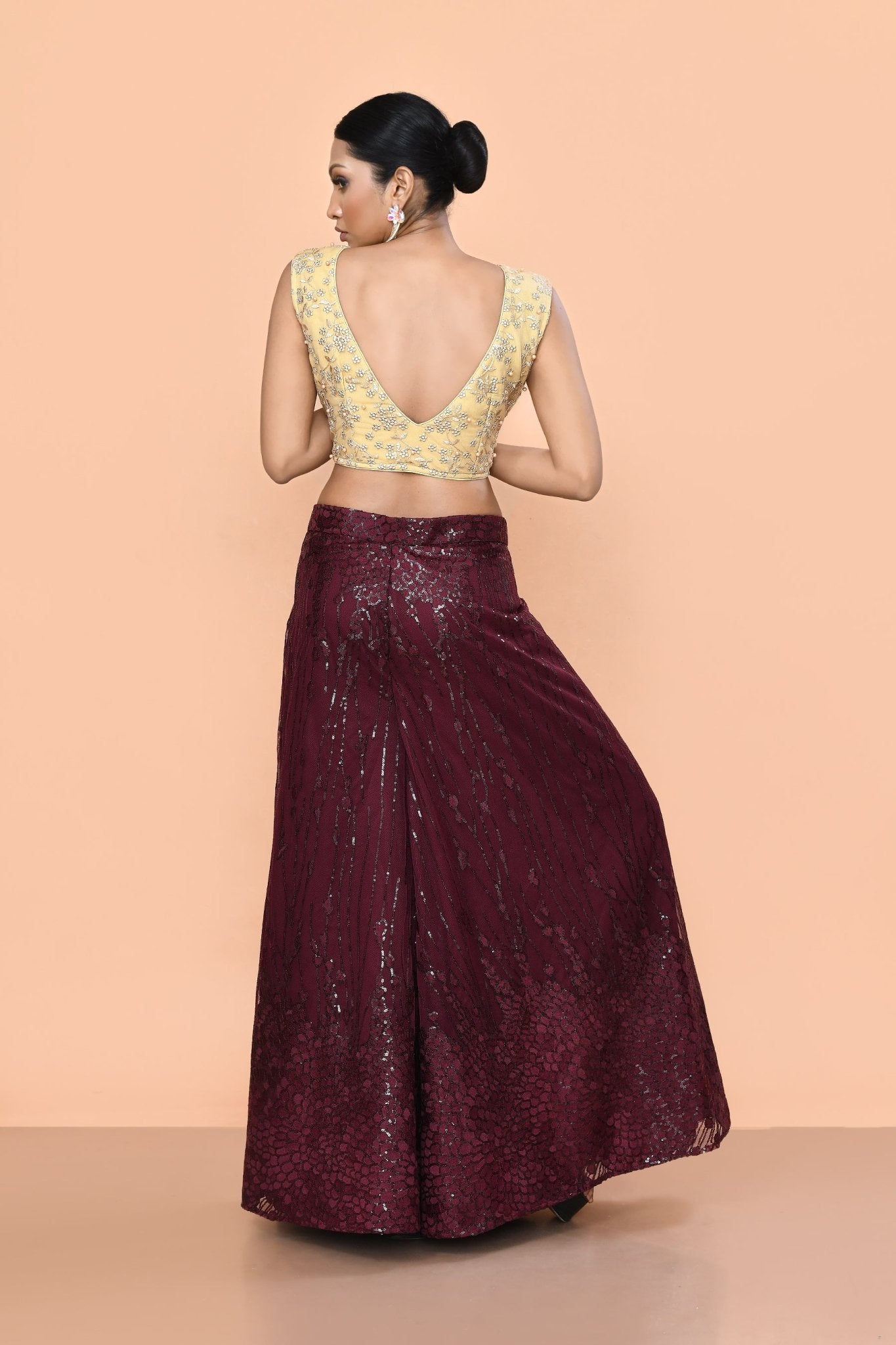 Designer Wear Maroon Net Palazzo With Golden Crop Top Set - Simaaya