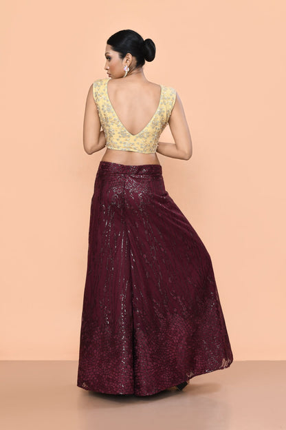Designer Wear Maroon Net Palazzo With Golden Crop Top Set - Simaaya