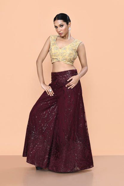 Designer Wear Maroon Net Palazzo With Golden Crop Top Set - Simaaya
